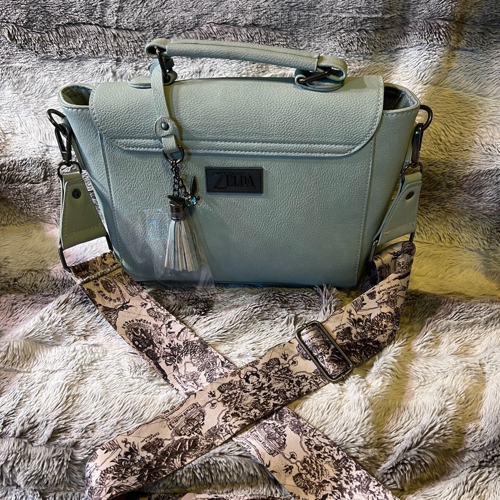 NWOTZelda light blue leather purse with handle and detachable long strapBioworld